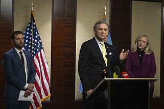 FILE - Rep. Jason Crow, D-Colo., left, Rep. French Hill, R-Ark, centre, and Abigail Spanberger, D-Va., right, during their briefing in Kyiv, Ukraine, Friday, Feb. 9, 2024. (AP Photo/Vasilisa Stepanenko)